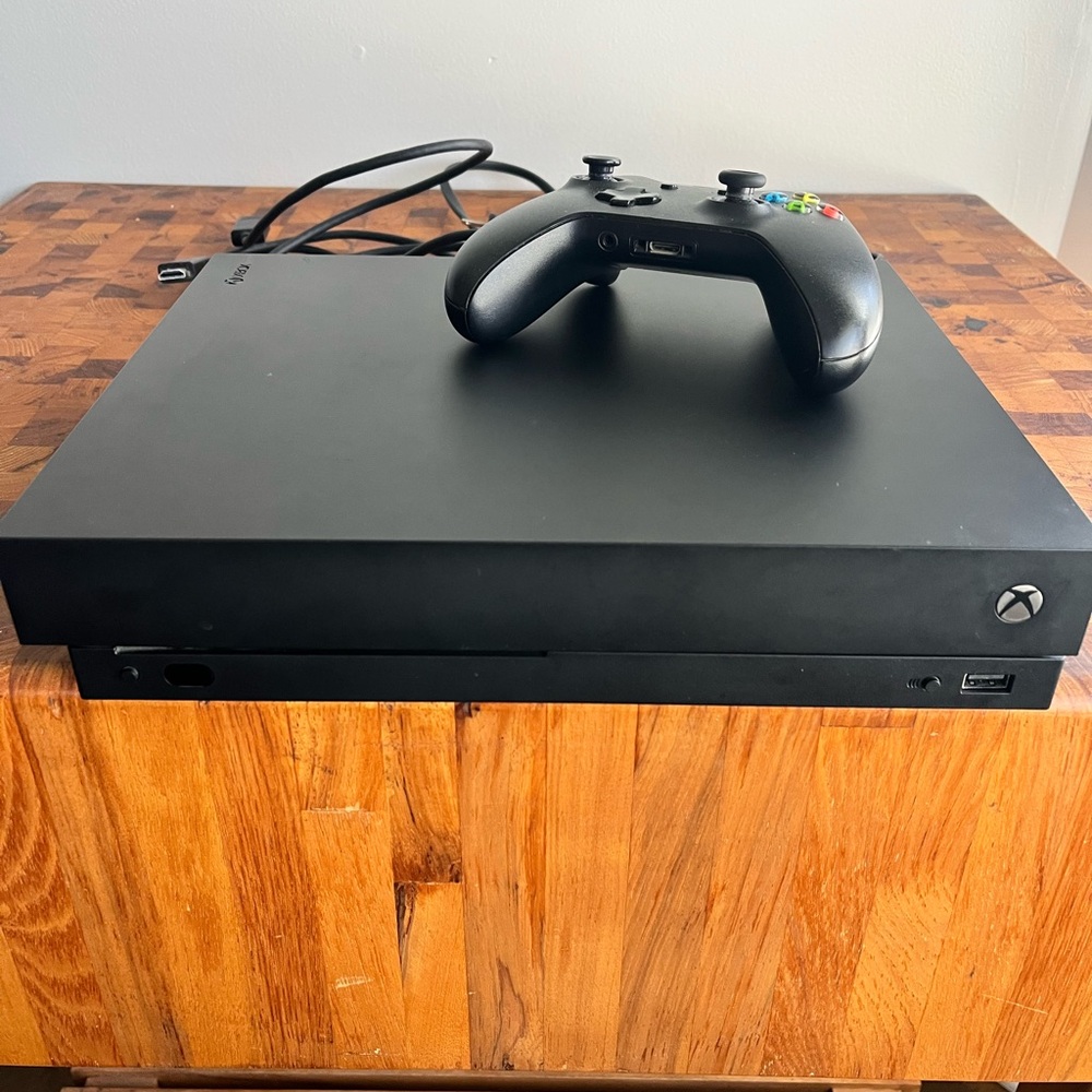 Sleek Black XBOX One X Console with Wireless Controller